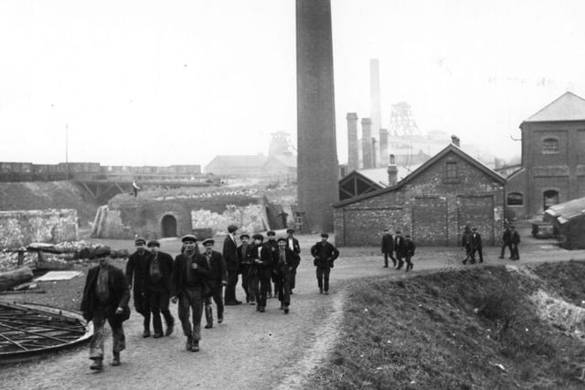 A group of coal miners leaving the mine on 1st February 1912.
