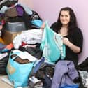 Ruth Eyre and Zoe Bradley sorting donations