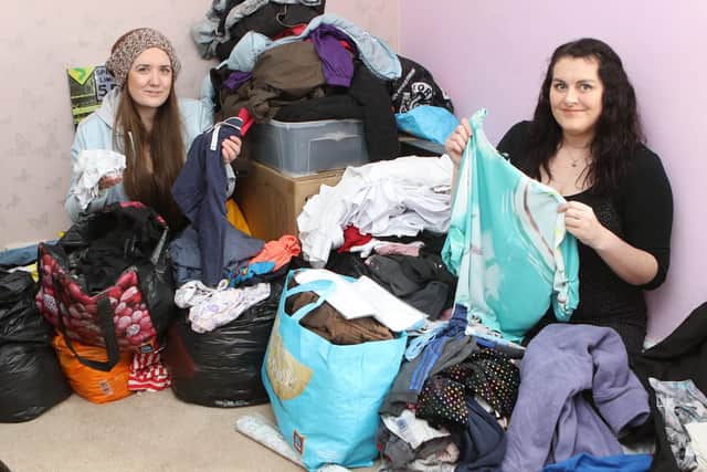 Ruth Eyre and Zoe Bradley sorting donations