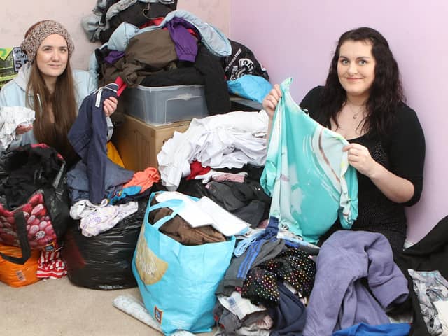 Ruth Eyre and Zoe Bradley sorting donations