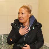 Rebecca Blunden in her wrecked flat which was flooded with human excrement