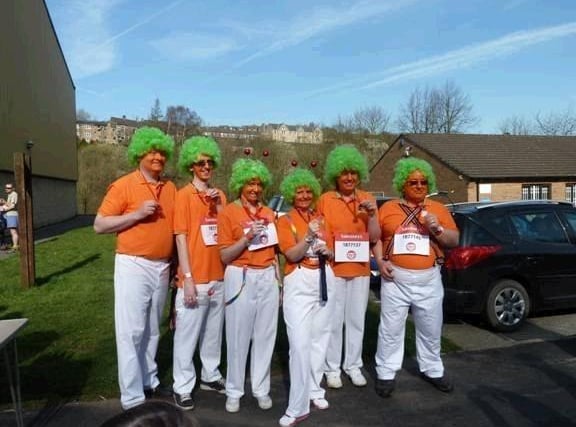 In 2012 six employees at Swizzels Matlow dressed up as Oompa Loompas to take part in a Sport Relief Mile through New Mills to Hayfield. Photo contributed.