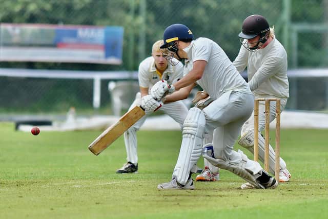 James Brotherton on his way to 57 as Broadbottom win at New Mills. Picture by John Fryer.