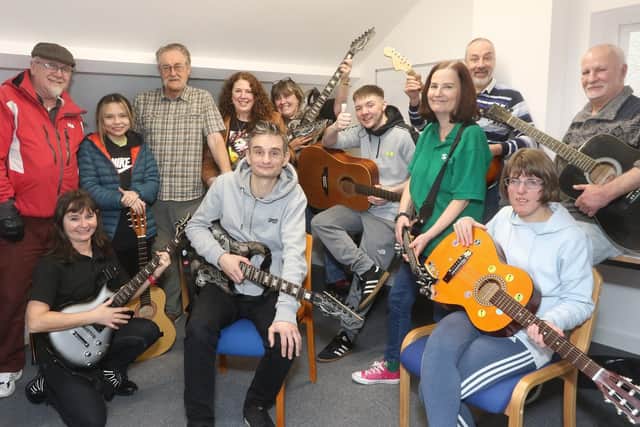 The guitar group at Zink with their newly donated instruments