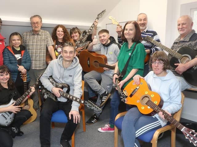 The guitar group at Zink with their newly donated instruments