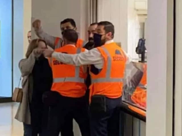 Michael is surrounded by Meadowhall security staff who tried to evict him from the premises. Picture by Craig from Doncaster.