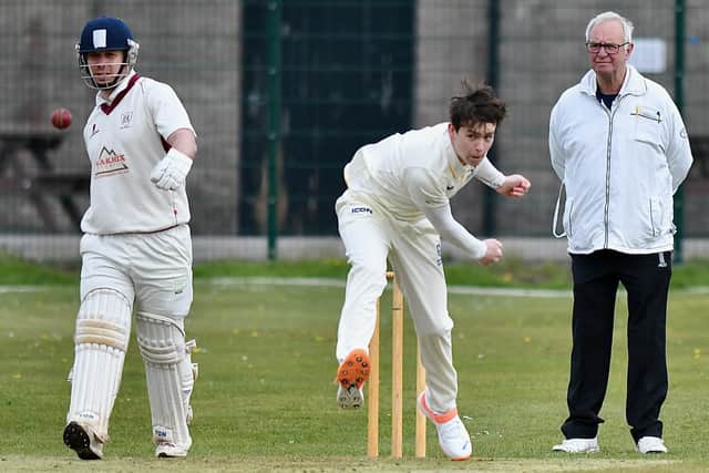 Mills' Tom Forder is bowled out for 15 by 14-year-old Theo Proctor. Photo by John Fryer.