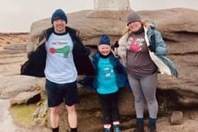 Scarlett Haystead with her mum Sam and dad Paul during their hike on Kinder Scout.