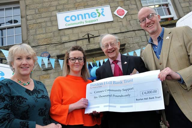 Roy Pickles with Roddie MacLean, right, also of Hall Bank Trust, handing over a £6,000 cheque to Rachael Mitchell, the befriending co-ordinator and chief executive Gill Geddes at the official launch of Connex Community Support
