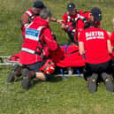 The injured walker received help from an off-duty paramedic who was nearby and Buxton Mountain Rescue Team.