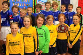 Fairfield Endowed Junior School's winning girls five a side football team and the boys team who came second.