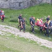 Matt had to be sat up in the stretcher so he could be transported down to a waiting ambulance. 
Image: EMRT