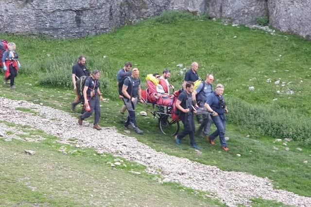 Matt had to be sat up in the stretcher so he could be transported down to a waiting ambulance. 
Image: EMRT