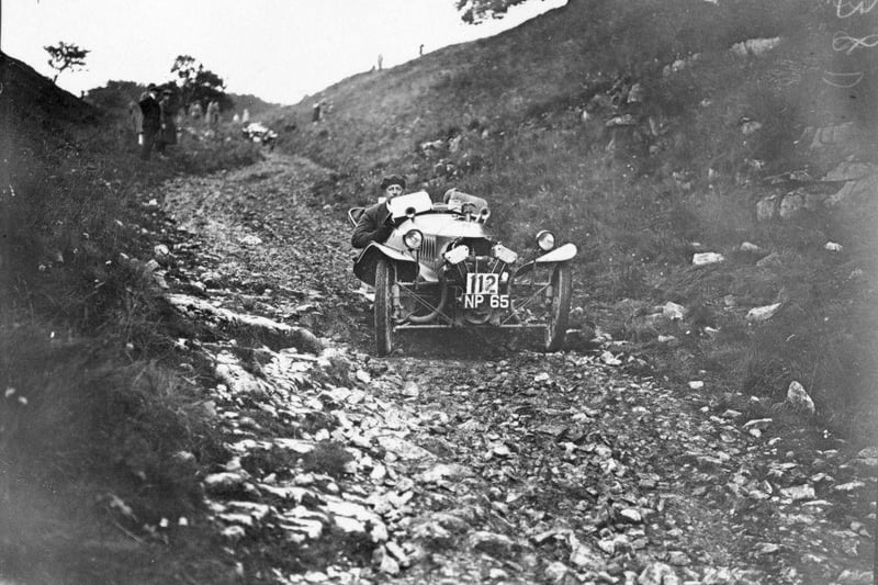 W A Carr driving down Blackwell Hill, Derbyshire on 17th August 1926 as part of a Six Days Reliability Trial.