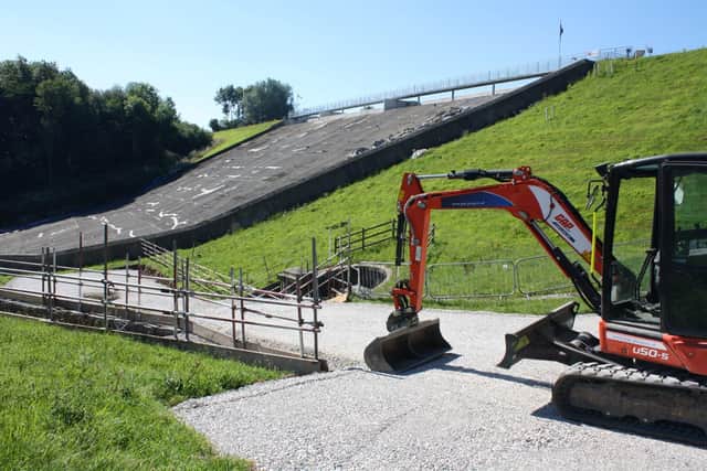 Construction work to repair the damaged dam at Toddbrook reservoir has started.