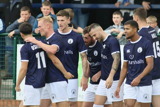 Buxton celebrate the third goal against Blyth Spartans on Saturday. Pic by Jason Chadwick.