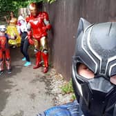 Andy's son Nathan, 12, - dressed as Black Panther - grabs a quick selfie of the costumed Covid-19 fighters on the prowl