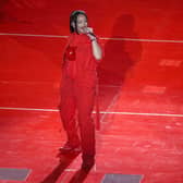 Rihanna on stage at the superbowl (photo: Getty Images)