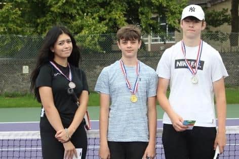 Winners of the club's Teens American Doubles Tournament.