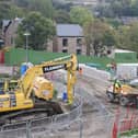 The view from the top of the dam looking over the construction site towards the park. Picture CRT