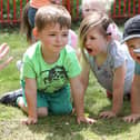 Mental Health and Wellbeing Day, Fairfield Infant School, nursery children doing relaxation exercises outside