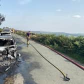 Firefighters are tackling the blaze amid fears it may spread to the moorland