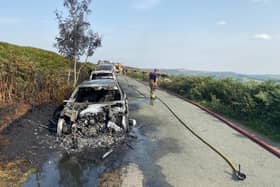 Firefighters are tackling the blaze amid fears it may spread to the moorland