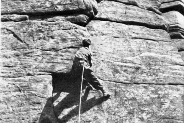 Joe Brown scales Stanage Edge's Right Unconquerable