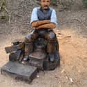 The newly restored Jack the Lime worker sitting proudly in Grin Low Woods once again