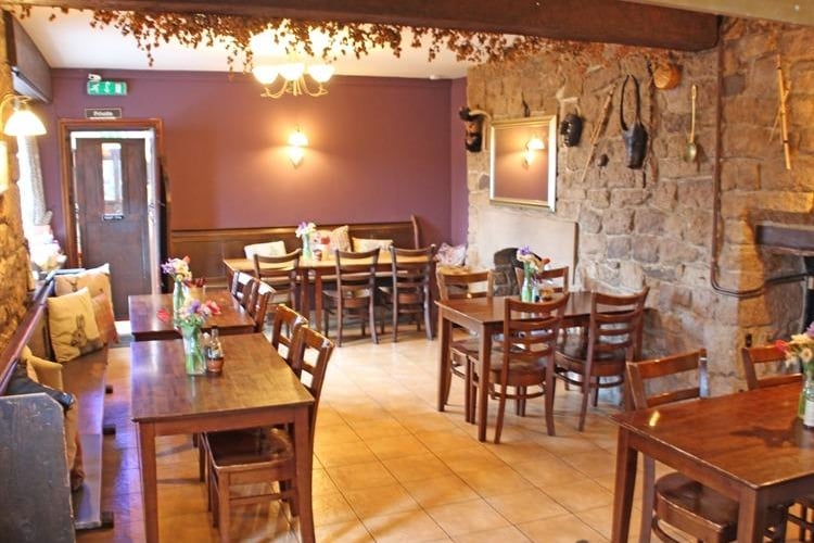 The Red Lion Inn accommodates 54 customers in three trade areas.