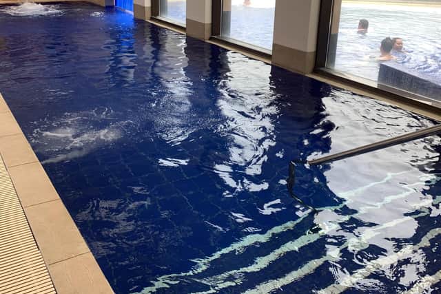 The indoor and outdoor rooftop pool.