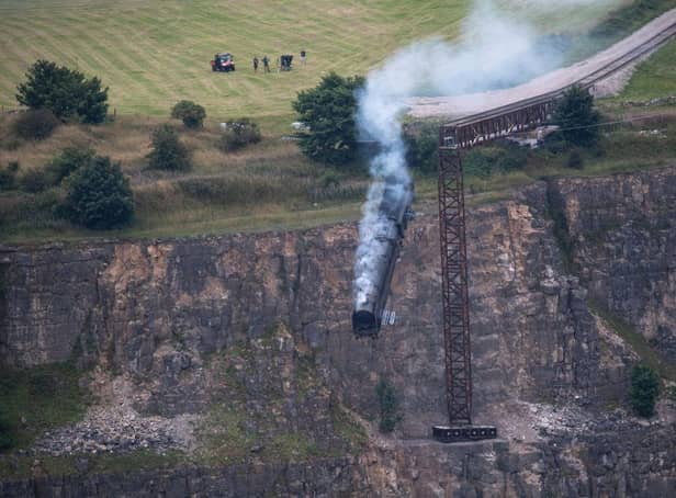 Derbyshire photographer Villager Jim captured the dramatic moment the train went over the edge.