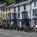 Motorcyclists park their bikes on the road in Matlock Bath . (Photo by PAUL ELLIS / AFP) (Photo by PAUL ELLIS/AFP via Getty Images)