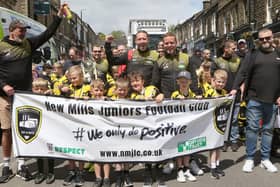 New Mills Juniors FC were all smiles during the carnival . Photo Jason Chadwick