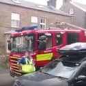 Police and firefighters sing happy birthday