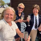 Jessica Limb (right), Vivienne Milburn (2nd from right), Group Instructor Alison Riley (left) and Group Chairperson Janine Frost toast the riders' success in the RDA Regional Dressage Qualifier.