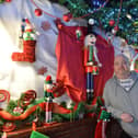 Mark Thomas, Landlord of The Hanging Gate in Chapel-en-le-Frith with the Christmas decorations the pub has kept up ahead of reopening on May 17.