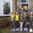 Tina Railton, back left, at Glenbrook with members of the 6th Buxton Methodist Brownies.
