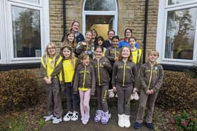 Tina Railton, back left, at Glenbrook with members of the 6th Buxton Methodist Brownies.