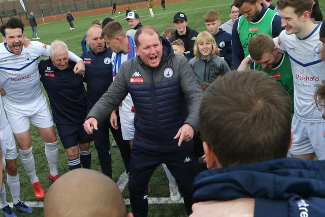 Manager Steve Cunningham and the Buxton players celebrate