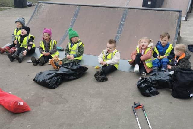 The High Peak Mini Litter Pickers who sat down for a well earned rest after tidiying their streets and the park