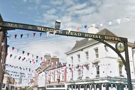 The controversial black head on the Ashbourne pub sign that has been taken down this week. Photo: Google Earth