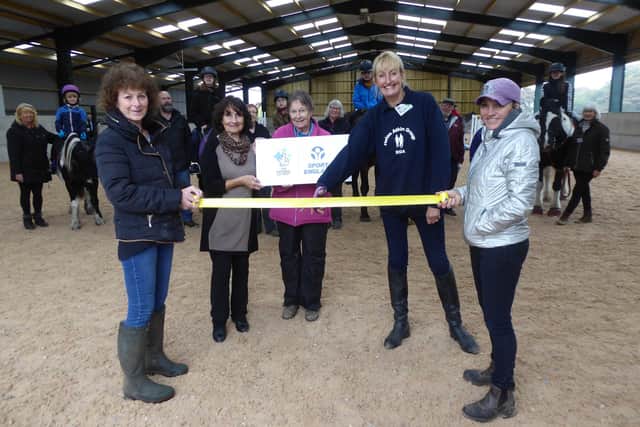 From left, Helen Atkin Group Buxton RDA founding members Caroline Watmough, Julie Andrew and Pat Atkin, chairman Janine Frost, and Buxton Riding School owner Louise Thompson.