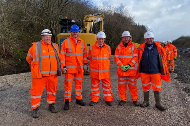 Rail minister Andrew Stephenson, second left, and High Peak MP Robert Largan, centre, on site with rail contractors.