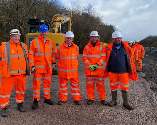 Rail minister Andrew Stephenson, second left, and High Peak MP Robert Largan, centre, on site with rail contractors.
