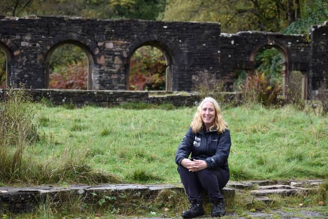 Dr Catherine Parker Heath among the ruins of Errwood Hall.
