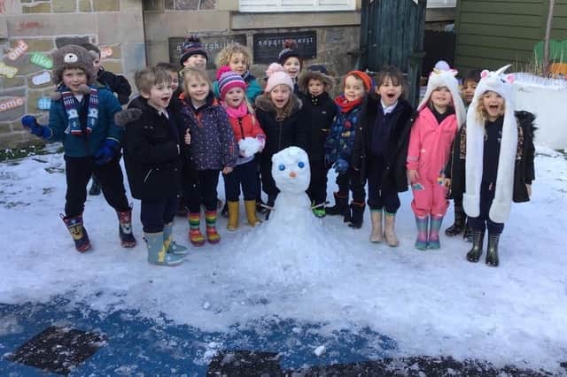 The Bumblebee reception class at Whaley Bridge Primary School enjoying the snow.Pic submitted