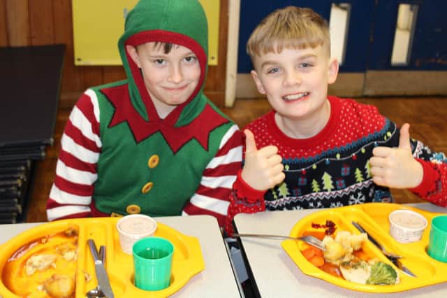 Thumbs up for Christmas Dinner at Fairfield Endowed Junior. Photo submitted