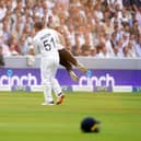 England's Johnny Bairstow carrying a Just Stop Oil protestor off the pitch  during day one of the second Ashes test match at Lord's, London. Adam Davy/PA Wire.