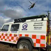 The injured walker was airlifted to safety.  Credit: Glossop MRT